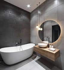 This bathroom uses a mixture of earth tones to bring to life an incredible design. 40 Modern Bathroom Design Ideas Plus Tips On How To Accessorize Yours Bathroomdesign Modernbat Modern Bathroom Design Small Bathroom Makeover Modern Bathroom