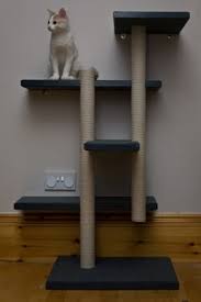 Making your own hanging cat scratcher is easier than you think with this upcycling idea using an antique cheese grater, canvas fabric, and sisal rope. How To Make Your Own Cat Trees Towers And Other Structures Pethelpful