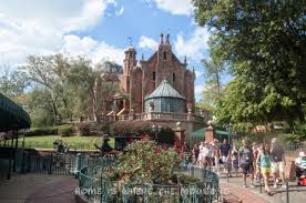 Greet singing ghosts, ghouls and spirits on this spooky dark ride filled with 999 happy haunts, including madame leota, hitchhiking ghosts and more. Disney Halloween Yard Decor Adventures In Familyhood