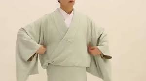 Do not wrap the kimono around your waist yet, because it won't be the right length. How To Wear A Kimono Part 3 How To Put On The Kimono Youtube