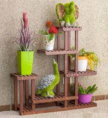 Mar 16, 2021 · to help you pick the right outdoor plant pot for your needs, we've broken down some of the pros and cons of the most typical materials on offer. Buy Classic Bench Type Wooden Flower Stand Solid Wood Diy Flowers Pots Stand Racks For Indoor Outdoor Brown By Sharpex Online Big Planters Pots Planters Home Decor Pepperfry Product
