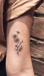 Small Black Sunflower Arm Tattoo Ideas Circle Flower Tricep Tat Ideas Pequenas Del Tatuaje Del Braz Tricep Tattoos Flower Tattoo Arm Delicate Flower Tattoo