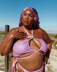 Lizzo teases swimwear launch with crystal Yitty bikini