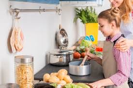 Ele loves to follow the instructions. Free Photo Daughter And Her Mother Cooking Soup In The Kitchen