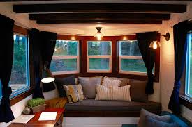 Six tiny houses, which range from 120 to 170 square feet, form a small community for guests, with shared outdoor seating spaces and campfires. Getting A Tiny Home As A Guest House Tiny Heirloom