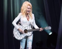 The patron saint of country music and vaccines talks about wig names, drugstore beauty, and her new fragrance scent from above. Dolly Parton Glitters Up Red River Rhinestone Cowgirl S Three Hour Stand Of Virtuosity Music The Austin Chronicle