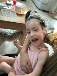 Can someone please work there magic and move my granddaughters arm from  across my face and remove the clothes