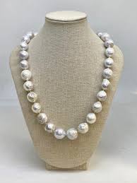 Additionally, if the necklace has beads or a graduated design, it's crucial to keep in mind that this will influence how the necklace will fall. Fresh Water Pearl Necklace By Design Jewellers Killarney Mall