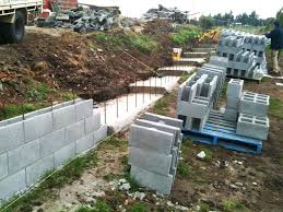 Reinforced concrete block retaining walls are a convenient way of building vertical retaining walls. Blockwork Retaining Wall Design