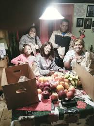 youth group delivers fruit baskets to