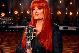 Wynonna Judd and John Fogerty Rock 'Proud Mary' for 'ACM Girls Night Out'  Crowd