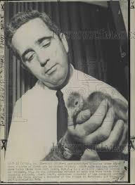 1968 Press Photo Glenn Smart holding a rare species of birth flown to  Maryland