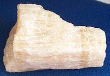 It is used as a flux for creating earthenware, and can be used as a fertilizer. Gypsum Wiktionary