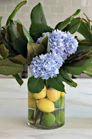 Hydrangea Flower Arrangement Hydrangea Magnolia And Citrus Hydrangea Flower Arrangements Summer Flower Arrangements Flower Arrangements