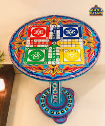 It has an eclectic look with bold contemporary lines paired with a rich, warm antique brown finish highlighting the unique beauty of natural pine wood. Coffee Table Ludo Pattern 104 Gul Khan