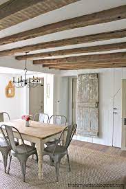 If your home doesn't have wood beams, you can still create the look. Primitive Home With Exposed Wood Beam Ceilings Wood Beam Ceiling Wood Doors Interior Home Decor