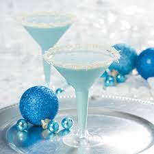 Snowflake Cocktail The Family Friendly Non Alcoholic Drink For The Season Find The Recipe At Orientaltrading Com Holiday Drinks Fun Drinks Christmas Drinks