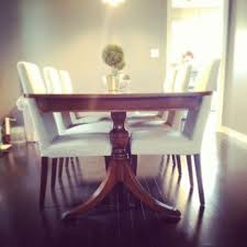 Maybe Some Chair Covers Will Update The Look Of My Great Grandma S Duncan Phyfe Dining Set Antique Dining Tables Dining Room Updates Dining Room Design
