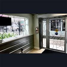 The custom door process is determined by your needs and guided by our expert craftspeople. North Park Bike Shop Custom Display Racks Security Grills Artifex Design House