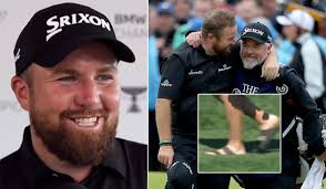 Watch: Shane Lowry explains his caddie's bizzare footwear