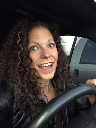 Pictures of Senegence distributors holding products between teeth