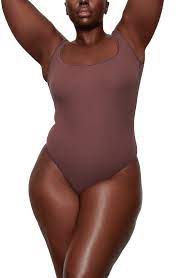 Skims Ribbed Stretch Cotton Bodysuit In Garnet Modesens