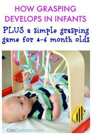 simple grasping play for your baby cando kiddo infant activities baby sensory play baby play activities