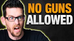 You've probably seen the no firearms or weapons allowed