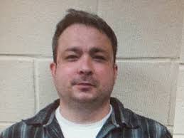 Sheriff's deputy charged with assaulting his wife after Facebook spat