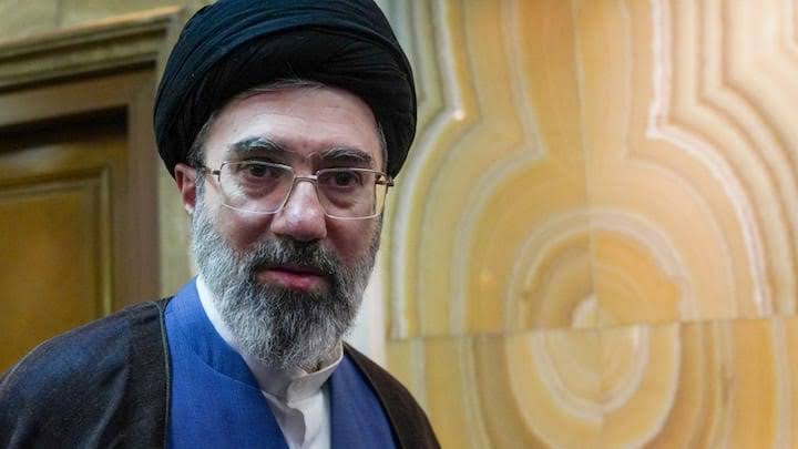 A portrait of Mojtaba Khamenei, son of the Supreme Leader, amid international reports regarding his health and whereabouts.