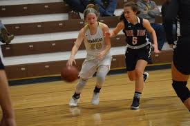 John Marshall Halts Losing Skid