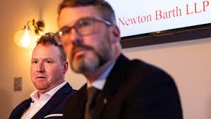 Former deputy says St. Louis sheriff illegally fired him