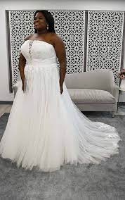 This white knee length wedding dress is available in exclusively plus sizes to ensure you look elegant on your big day. Strapless A Line Plus Size Wedding Dress With Illusion Plunge Stella York Wedding Dresses