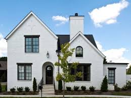 Others have varying amounts of white mixed with natural tones. 10 Beautiful Black White Exteriors Becki Owens White Exterior Houses Painted Brick House White Brick Houses