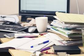 Is Your Desk Overflowing With Scraps Of Paper Coffee Cups Envelopes And Wilted Plants Well Far From Being Idle Messy Desk Paper Clutter Organization Hacks