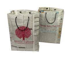 To make your newspaper bag more durable, you can add a thick cardboard in the bottom. Recycled Newspaper Bags Can Be Beautifully Decorated Or Made With Wrapping Paper Newspaper Bags Paper Bag Crafts Paper Bag
