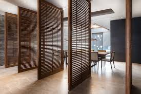 Wood partitions delimit the space and also add aesthetic value to the interiors. 7 Ways To Partition Your Home Without Building Walls