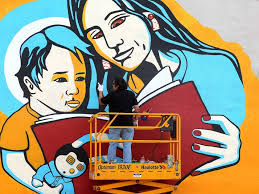 Epic Jonathan Thunder mural enlivens Zenith Bookstore exterior