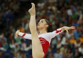Russia S Aliya Mustafina Competes In The Women S Gymnastics Floor Exercise Final In The North Greenwi Gymnastics Posters Artistic Gymnastics Olympic Gymnastics