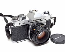 Use a penny to unscrew the battery cover. Foto En Camera Asahi Pentax K1000 Smc Pentax W 1 2 50mm Lens Luxclusif Com