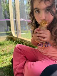 My feathered children enjoying a frozen treat