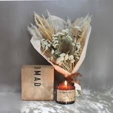 These pressed flower candles are a great way to bring flowers and greenery inside for the cooler months ahead. Dried Flower And Soy Wax Vegan Candle Giftbox By The Nomad Society Notonthehighstreet Com