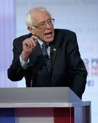 At the Democratic Debate, Bernie Sanders Wags His Finger at Hillary Clinton  | Glamour