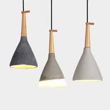 Buy Timber Raw Concrete Pendant Light Online By Living Our hanging pendant lights will surely tickle your senses with their modern colours and designs.
