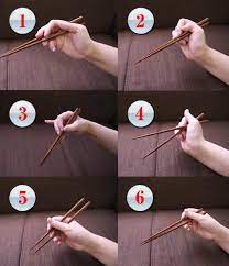 How To Use Chopsticks Chopsticks Using Chopsticks How To Hold Chopsticks