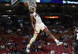 He played one season of college basketball for the unlv runnin' rebels before joining the phoenix suns in 2016. Even In Defeat All Eyes Were On The Heat S Derrick Jones Jr After Gravity Defying Alley Oop The Athletic