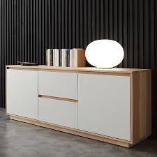 Sa structure massive et l'essence de bois qui le composent en font on peut ainsi y ranger la vaisselle comme les affaires du quotidien. Bahut Moderne Blanc Et Bois Kasalinea