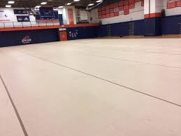 After Refinishing Your Gym Floor Protect It During Events With A Tarp Flooring Gym Outdoor Decor