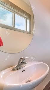 free standing sink round mirror