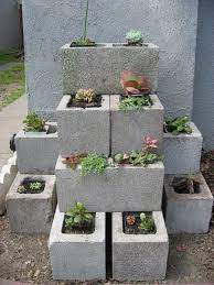 Whether you want to construct a privacy wall or a retaining wall, the principle is the same. Cinder Block Garden Wall Garden Projects Cinder Block Garden Plants